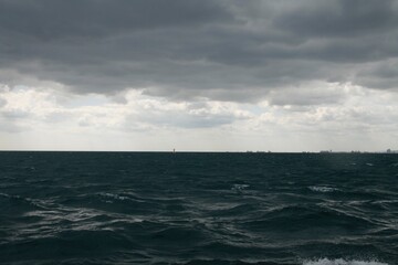 Cloudy Sky and Dark Sea