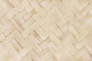 Old bamboo weaving pattern, woven rattan mat texture for background and design art work.