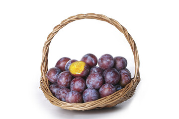 Fresh Xinjiang Prunes in Wicker Basket on White Background - Healthy Dried Fruit Snack