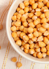 tasty boiled chickpeas on the table close-up. Vertical photo format