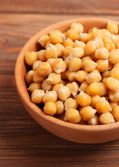 tasty boiled chickpeas on the table close-up. Vertical photo format
