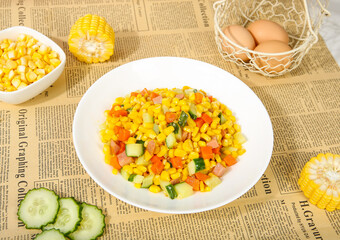 Fresh Corn Kernel Mixed Vegetable Salad with Colorful Ingredients on Rustic Newspaper Background
