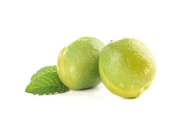 Fresh Green Xinjiang Apricots with Water Drops and Mint Leaf on White Background