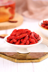Dried Red Goji Berries Wolfberries in White Bowl Traditional Chinese Superfood Health Food Ningxia