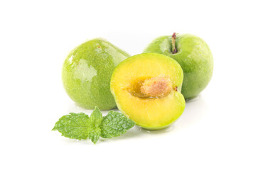 Fresh Green Plums with Mint Leaves Isolated on White Background