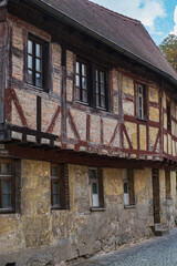 The facade of an old half-timbered building in Middle Franconia in need of renovation