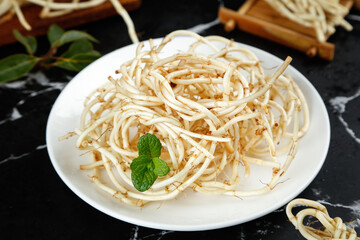 Fresh Folding Ear Root Vegetable Noodles - Traditional Chinese Guizhou Sichuan Cuisine with Mint Garnish