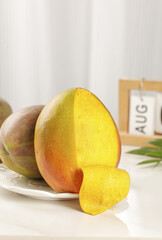 Fresh Ripe Mango Slices on White Plate - Tropical Fruit Ready to Eat