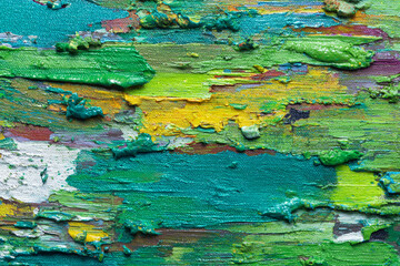 Vibrant green yellow and blue oil paint texture abstract art canvas close up