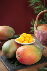 Fresh Ripe Mangoes with Golden Cubed Flesh on Slate Board Tropical Fruit Still Life