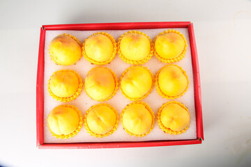 Fresh Yellow Peaches in Red Gift Box on White Background