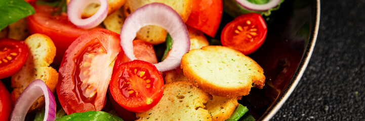 Panzanella salad tomato, croutons, onions vegetables dish natural product tasty snack fresh delicious gourmet food background on the table rustic top view copy space