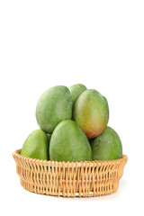 Fresh Green Panzhihua Mangoes from Sichuan in Wicker Basket on White Background