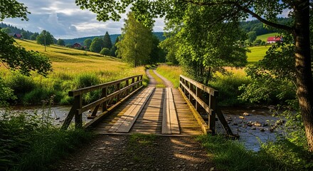 Picturesque Wooden Bridge Spanning a Gentle Stream Amidst Lush Greenery and Rolling Hills Under a Dynamic Sky