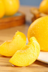 Fresh Golden Yimeng Mountain Nectarine Slices Display on Wooden Board