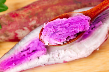 Purple Sweet Potato Ice Cream on Wooden Spoon - Natural Colorful Dessert Ingredients