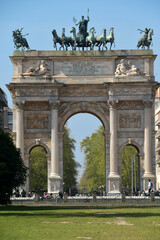 Obraz premium The Arco della Pace is a triumphal arch in Milan located at the beginning of Corso Sempione. Its beautiful decorations and nineteenth-century ornaments make it spectacular.