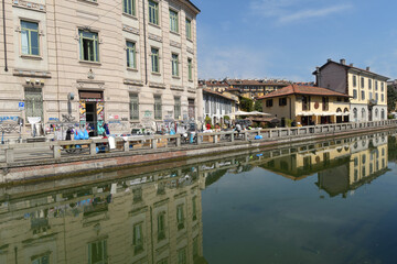 The Navigli are a system of navigable canals in Milan and a characteristic area of the city, like the Darsena and recreational activities such as aperitifs and markets.