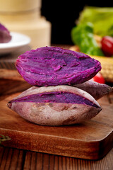 Fresh Purple Sweet Potatoes Cut in Half on Wooden Cutting Board Kitchen Food Photography