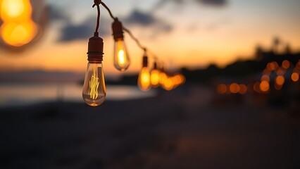 Sunset beach with soft-focus hanging lights, evoking a serene and dreamy coastal atmosphere.