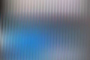 Illustration of abstract background with vertical lines and blurred blue and silver tones