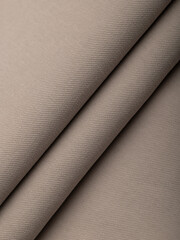 Light, dense fabric for sewing clothes, ironed, the texture of the fabric is visible