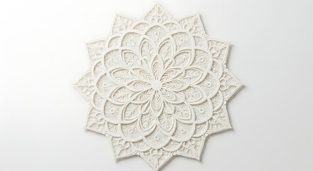 Fototapeta premium Ornate white paper mandala with intricate floral and leaf designs on a plain white background surface