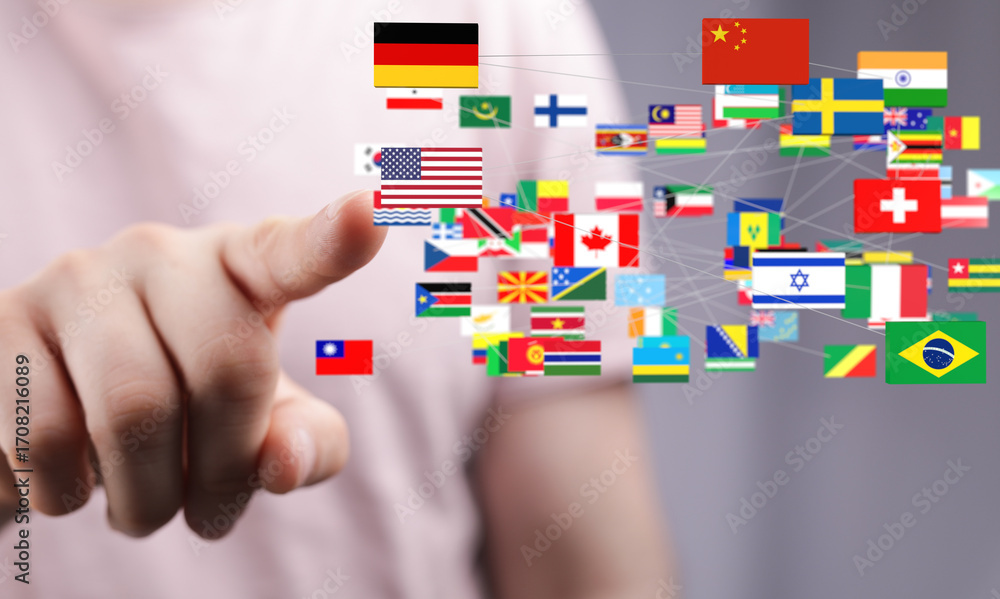 Poster a hand interacts with a digital network of world flags, representing global interconnectedness.