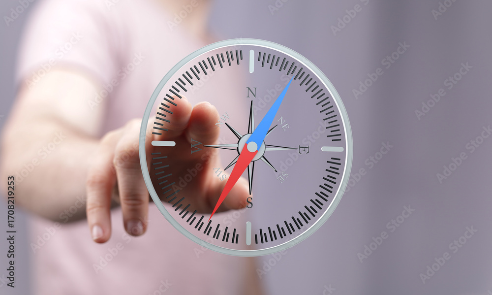 Poster hand interacts with a virtual compass, showing direction and guidance. ideal for navigation, travel,