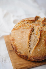 Sliced homemade whole grain sourdough bread with a rustic crust