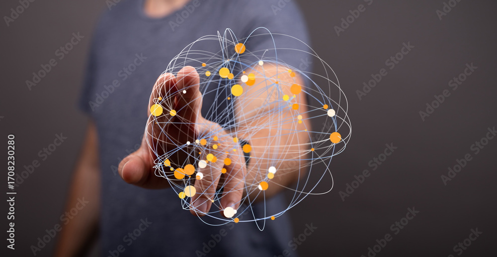 Poster man interacts with a digital network, showcasing global connectivity and data visualization.