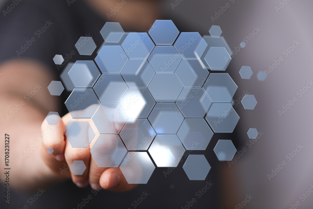 Poster abstract image of a hand interacting with a digital hexagon interface. perfect for tech, innovation,