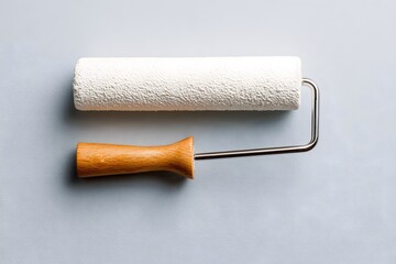 Obraz premium White textured roller wooden handle paint roller white roller