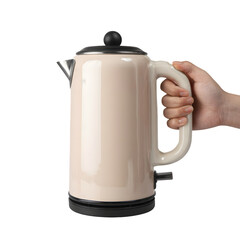 Obraz premium A hand holding a beige electric kettle with a black lid and base, isolated on a transparent background, showcasing a modern kitchen appliance for brewing hot beverages