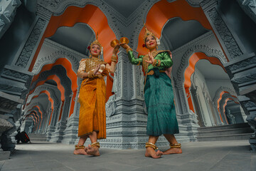 Traditional Khmer apsara dancers perform at a pagoda in Tra Vinh province, Vietnam