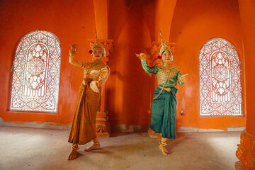 Traditional Khmer apsara dancers perform at a pagoda in Tra Vinh province, Vietnam
