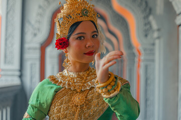 Traditional Khmer apsara dancers perform at a pagoda in Tra Vinh province, Vietnam