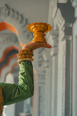 Khmer apsara traditional dance performer hand gesture at a pagoda in Tra Vinh province, Vietnam