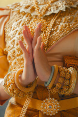 Khmer apsara traditional dance performer hand gesture at a pagoda in Tra Vinh province, Vietnam