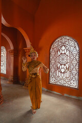 Traditional Khmer apsara dancers perform at a pagoda in Tra Vinh province, Vietnam
