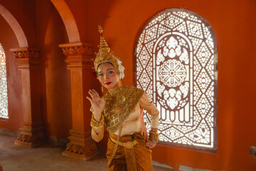 Traditional Khmer apsara dancers perform at a pagoda in Tra Vinh province, Vietnam