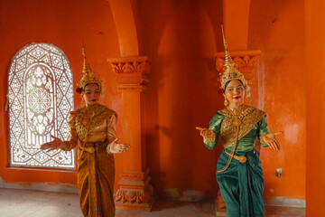 Traditional Khmer apsara dancers perform at a pagoda in Tra Vinh province, Vietnam