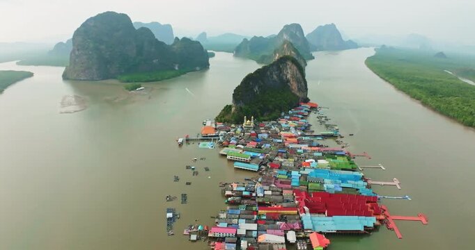 Aerial drone wide angle view Koh Panyee island, a Famous Floating Village in Phang Nga Bay, Thailand