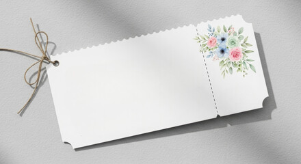 Blank floral ticket stub featuring watercolor roses and eucalyptus perfect for wedding invitations and stationery designs