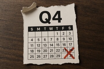 A torn calendar page displays "Q4" with a marked date, indicating the end of the year and a focus on quarterly planning or deadlines.