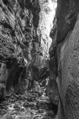 First chockstone on the Rainbow Gorge hiking trail. Monochrome