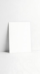 Naklejka premium Blank White Square Card Mock up Against a Clean White Wall