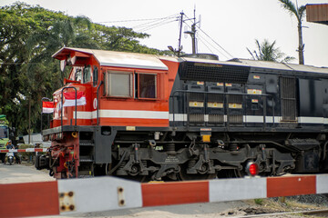 Red and black train view. Train. Red and black train is passing by.