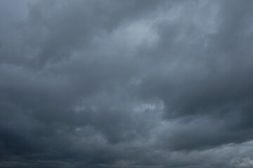 Black cloudy sky texture background. Climate and weather concept. For graphic design and banners