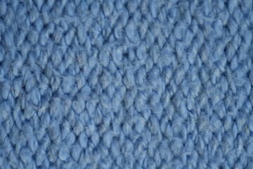 blue texture of knitted acrylic fabric